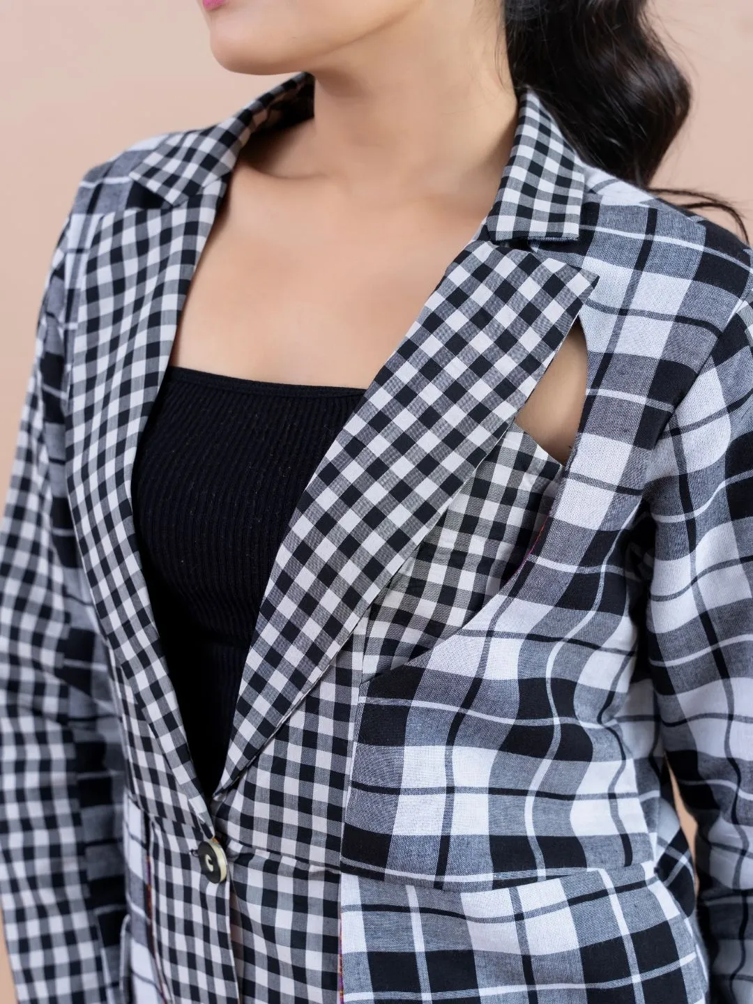 modish yarn dyed cotton checked stylized lapel collared jacket with 3\4 sleeve and handy pockets.- Black